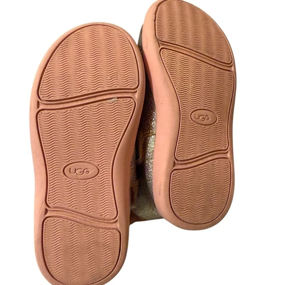 UGG’s Sparkly Gold and Pink Boots.